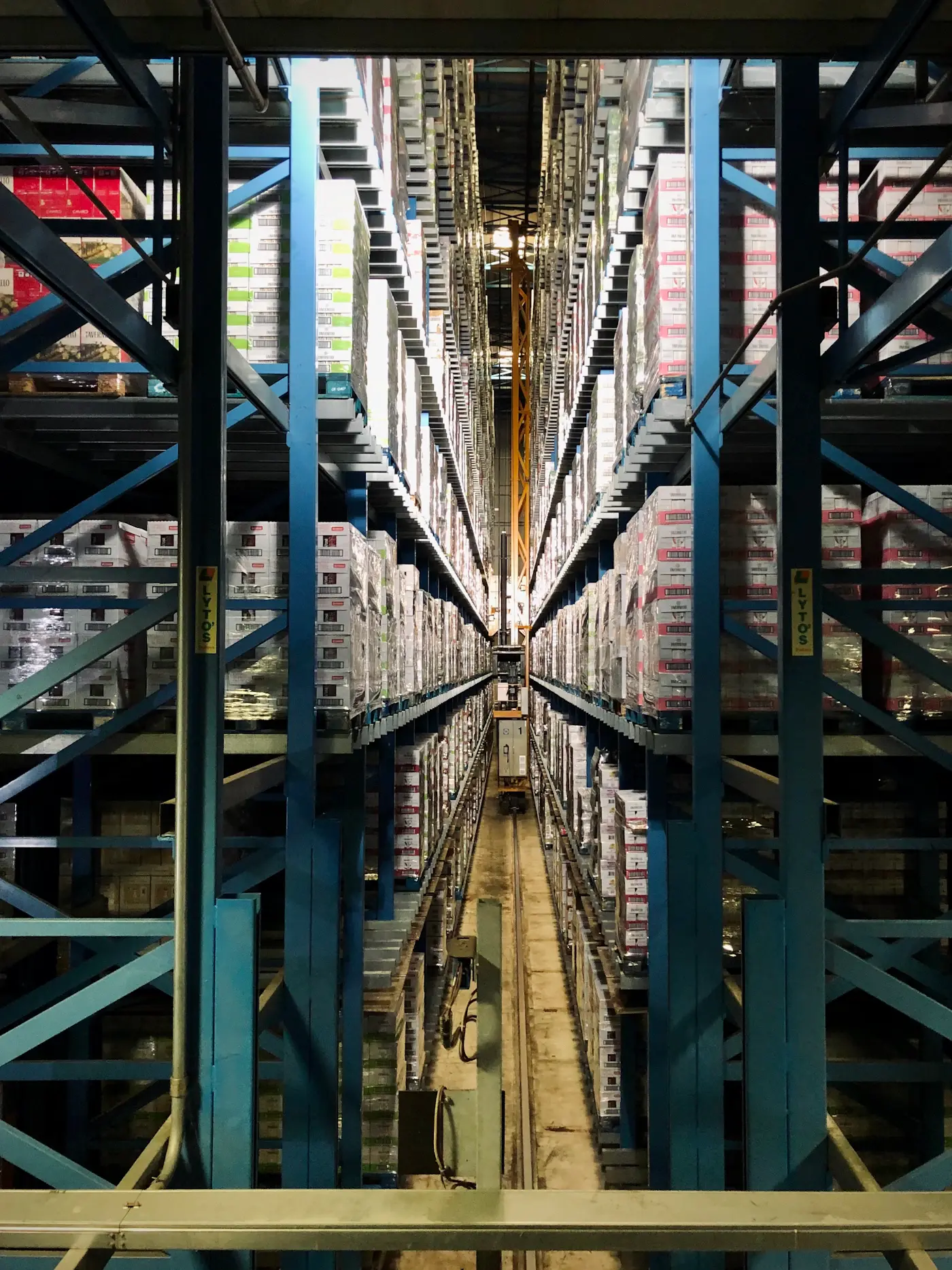 Shelving filled with stacked boxes in a warehouse