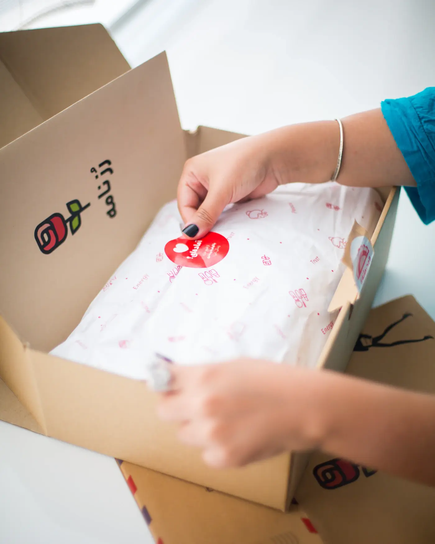 An online order being packed into a box